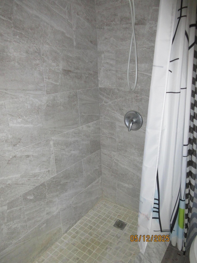 241 Normandy F, Delray Beach, FL 33484 - bathroom featuring tiled shower