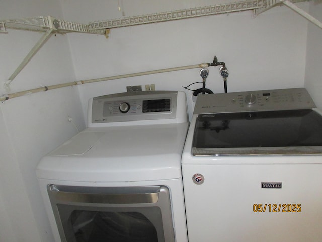241 Normandy F, Delray Beach, FL 33484 - laundry room featuring washer and dryer