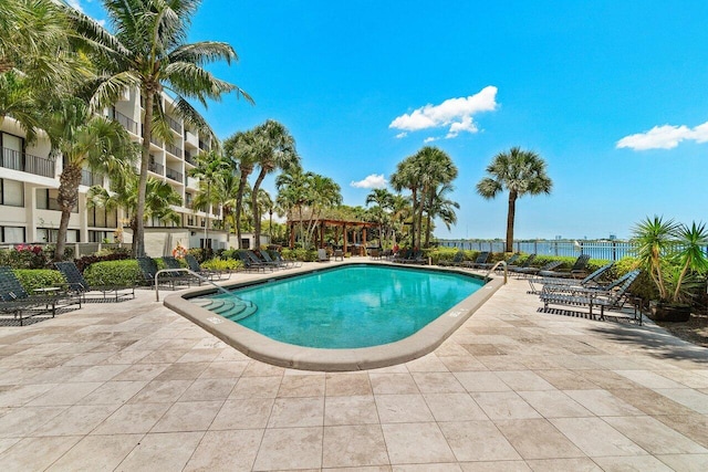 1830 Embassy Dr Unit 401, West Palm Beach, FL 33401 - community pool featuring a patio area