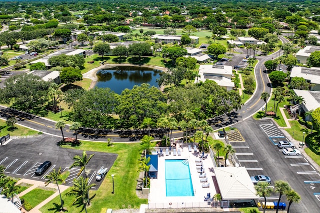 23 Stratford Dr Unit H, Boynton Beach, FL 33436 - drone / aerial view of a pool area and a large body of water