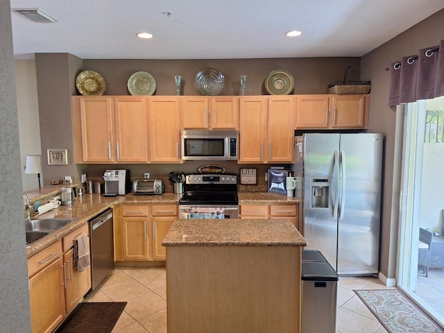 3172 N Greenleaf Cir, Boynton Beach, FL 33426 - kitchen featuring stainless steel appliances, light brown cabinetry, light tile patterned flooring, and recessed lighting