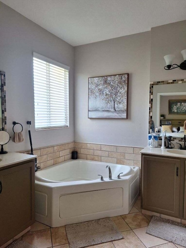 3172 N Greenleaf Cir, Boynton Beach, FL 33426 - full bathroom featuring vanity, tile patterned flooring, and a garden tub