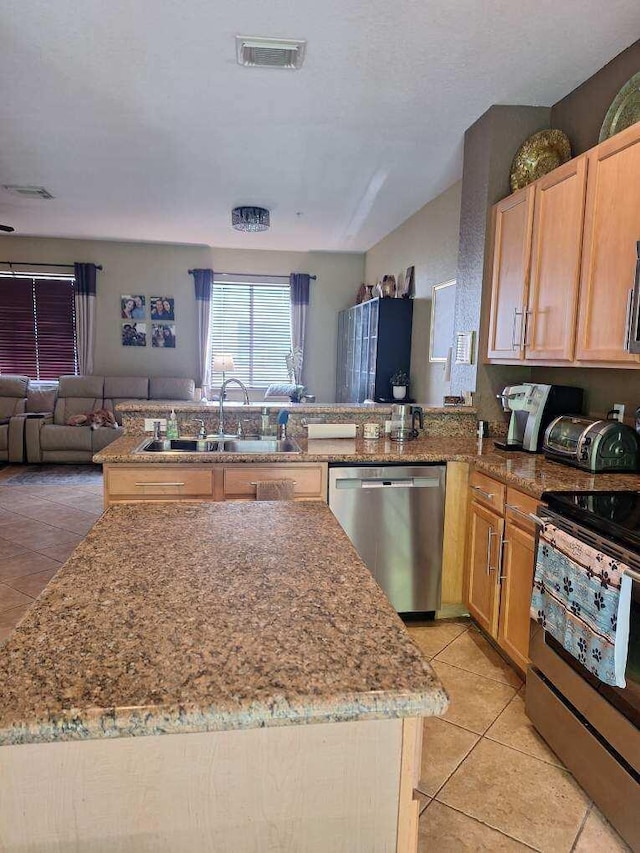 3172 N Greenleaf Cir, Boynton Beach, FL 33426 - kitchen featuring stainless steel appliances, light tile patterned floors, and light stone countertops
