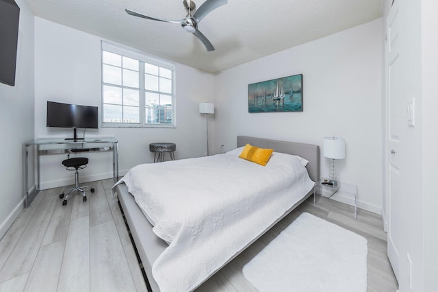 651 Okeechobee Blvd Unit 702, West Palm Beach, FL 33401 - bedroom featuring wood finished floors and ceiling fan