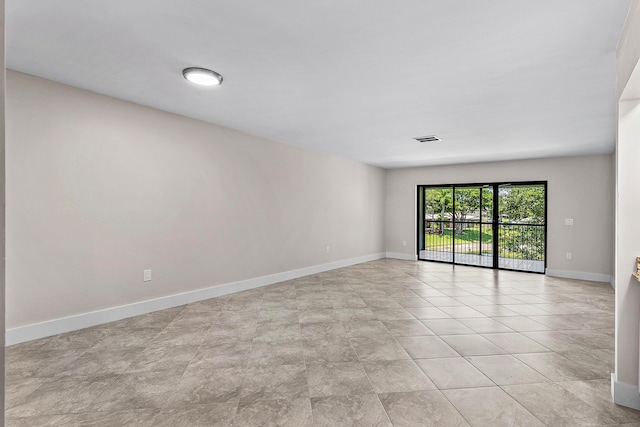 24 Stratford Dr Unit F, Boynton Beach, FL 33436 - unfurnished room featuring baseboards