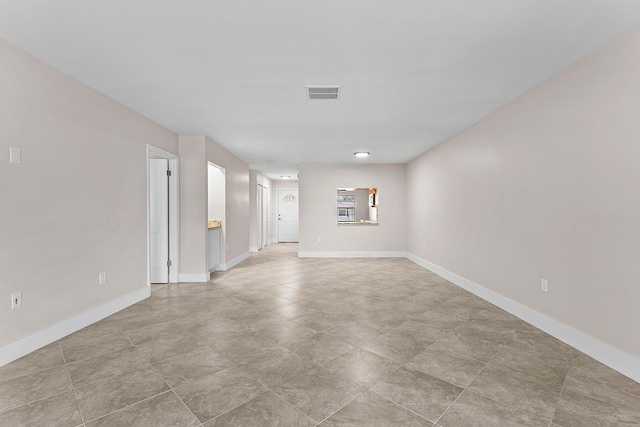 24 Stratford Dr Unit F, Boynton Beach, FL 33436 - empty room with baseboards