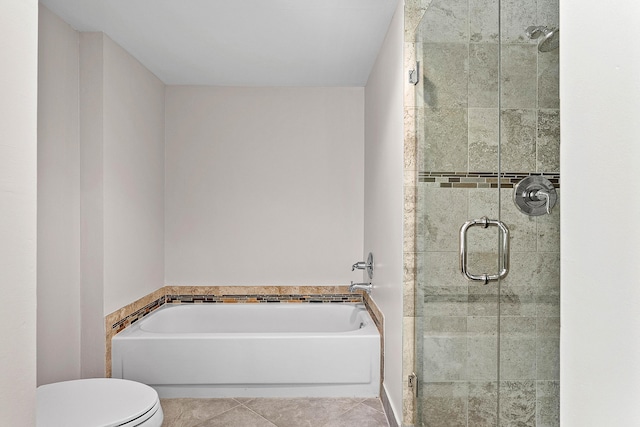 24 Stratford Dr Unit F, Boynton Beach, FL 33436 - full bathroom with a bath, a stall shower, and tile patterned flooring
