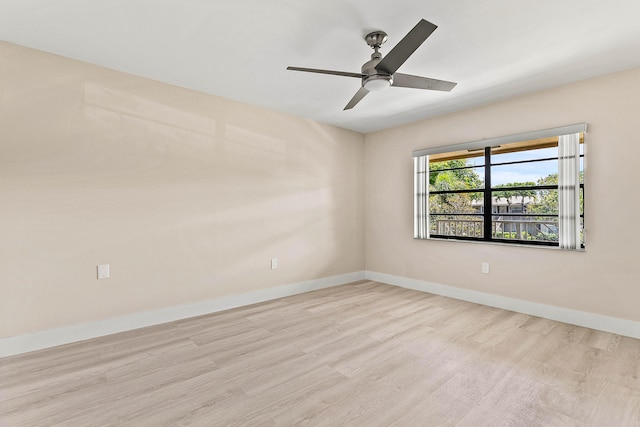 24 Stratford Dr Unit F, Boynton Beach, FL 33436 - empty room with light wood finished floors and ceiling fan