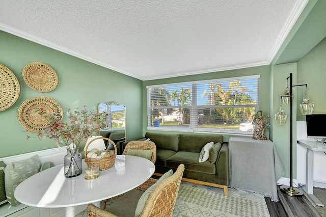 1446 W Perry St, Lantana, FL 33462 - dining area featuring ornamental molding, a textured ceiling, and wood finished floors
