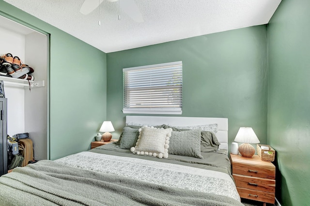 1446 W Perry St, Lantana, FL 33462 - bedroom featuring ceiling fan and a textured ceiling