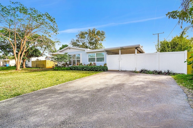 1446 W Perry St, Lantana, FL 33462 - view of front facade with a gate
