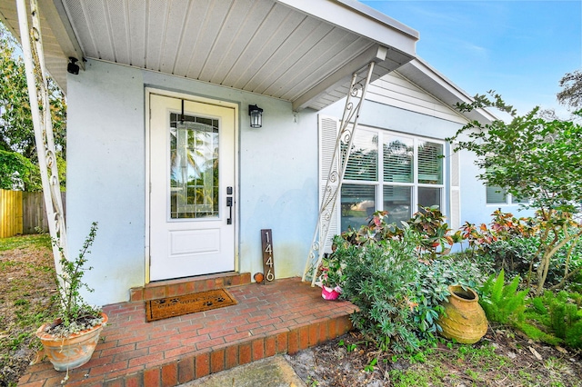 1446 W Perry St, Lantana, FL 33462 - view of exterior entry with stucco siding