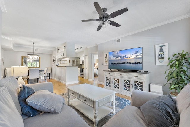 2218 Tuscany Way, Boynton Beach, FL 33435 - living room featuring light wood-style floors, ceiling fan, and ornamental molding