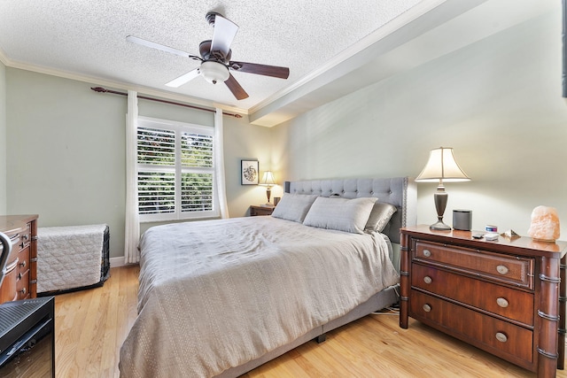 2218 Tuscany Way, Boynton Beach, FL 33435 - bedroom with ornamental molding, a textured ceiling, light wood finished floors, and ceiling fan