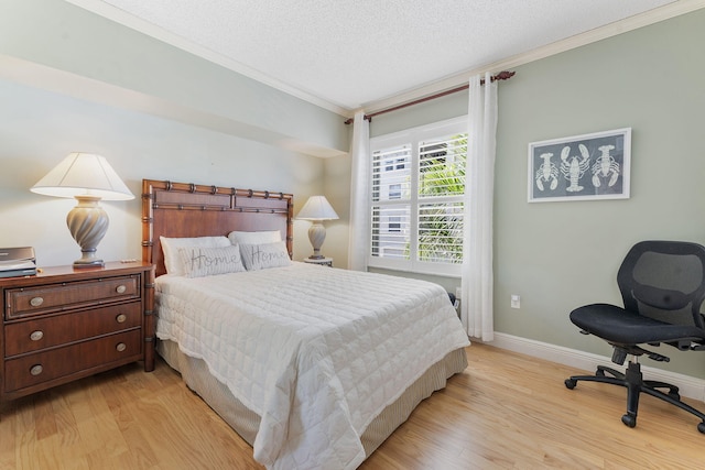 2218 Tuscany Way, Boynton Beach, FL 33435 - bedroom with ornamental molding, light wood-style flooring, and a textured ceiling