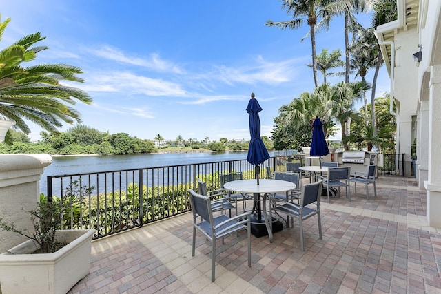 2218 Tuscany Way, Boynton Beach, FL 33435 - view of patio / terrace with a water view and outdoor dining space