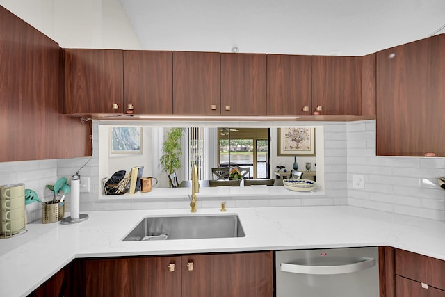 7861 Lexington Club Blvd Unit A, Delray Beach, FL 33446 - kitchen with stainless steel dishwasher, modern cabinets, light countertops, and decorative backsplash