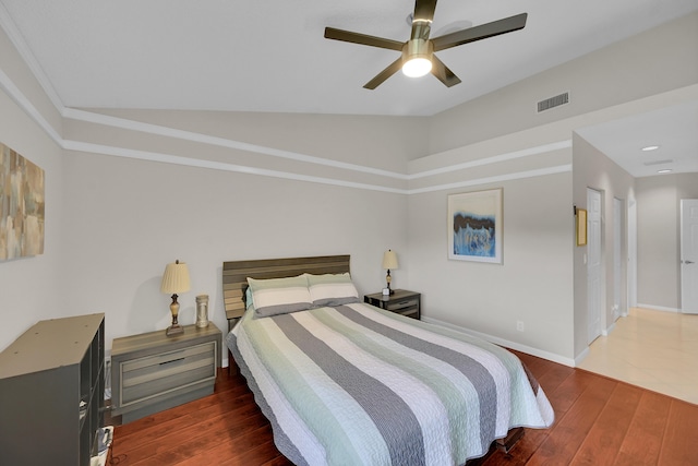 7861 Lexington Club Blvd Unit A, Delray Beach, FL 33446 - bedroom featuring vaulted ceiling, hardwood / wood-style floors, and ceiling fan
