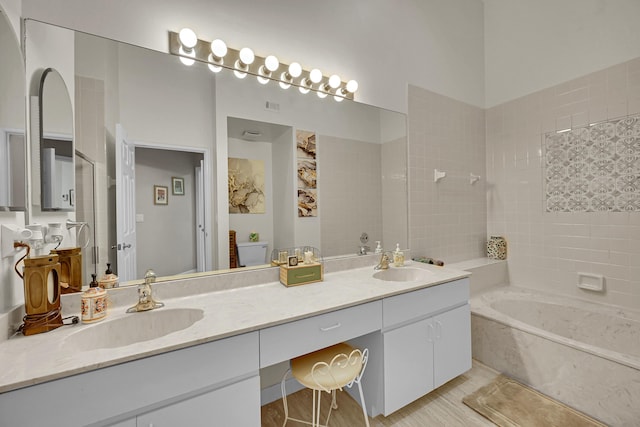 7861 Lexington Club Blvd Unit A, Delray Beach, FL 33446 - bathroom featuring a bath and double vanity