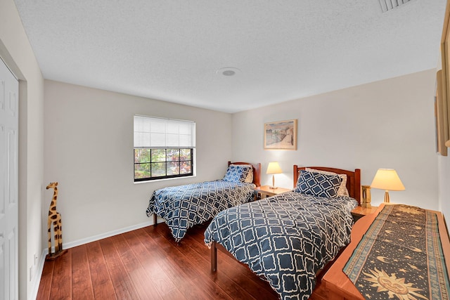 7861 Lexington Club Blvd Unit A, Delray Beach, FL 33446 - bedroom featuring wood finished floors and a textured ceiling