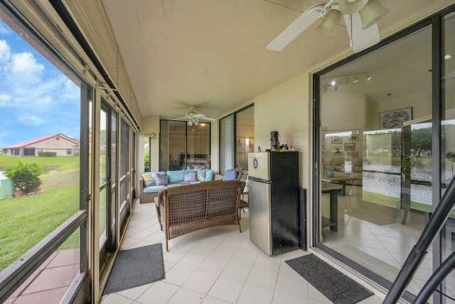 7861 Lexington Club Blvd Unit A, Delray Beach, FL 33446 - sunroom featuring ceiling fan and an outdoor living space