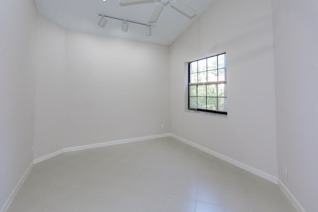 7861 Lexington Club Blvd Unit A, Delray Beach, FL 33446 - spare room with rail lighting, ceiling fan, and light tile patterned floors
