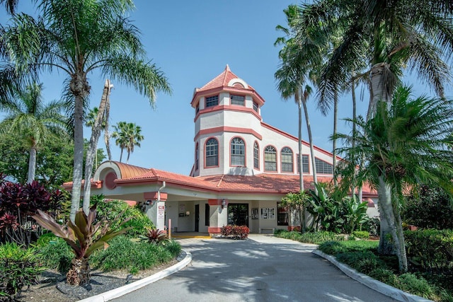 7861 Lexington Club Blvd Unit A, Delray Beach, FL 33446 - view of building exterior with driveway