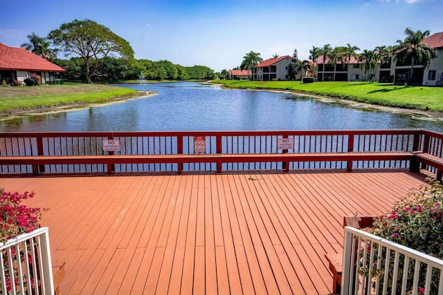 7861 Lexington Club Blvd Unit A, Delray Beach, FL 33446 - dock featuring a deck with water view