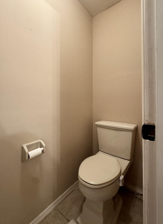 610 SE Forgal St, Port Saint Lucie, FL 34983 - bathroom featuring toilet