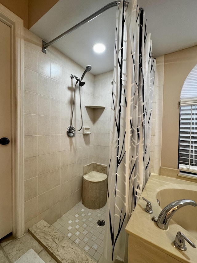 610 SE Forgal St, Port Saint Lucie, FL 34983 - bathroom featuring tiled shower and a tub to relax in