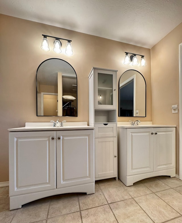 610 SE Forgal St, Port Saint Lucie, FL 34983 - bathroom featuring vanity and tile patterned floors