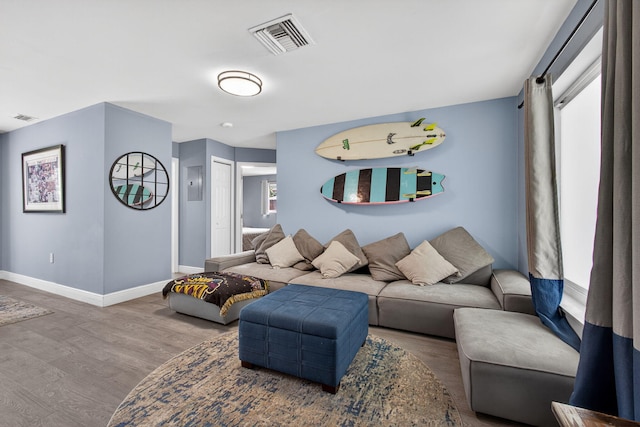 306 N A St, Lake Worth Beach, FL 33460 - living area featuring wood finished floors, healthy amount of natural light, and electric panel