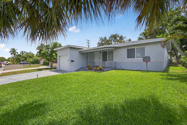 306 N A St, Lake Worth Beach, FL 33460 - ranch-style home featuring covered porch, a garage, a front yard, driveway, and brick siding