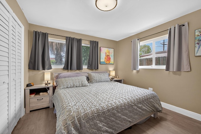 306 N A St, Lake Worth Beach, FL 33460 - bedroom featuring wood finished floors and a closet