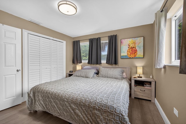 306 N A St, Lake Worth Beach, FL 33460 - bedroom with wood finished floors and a closet