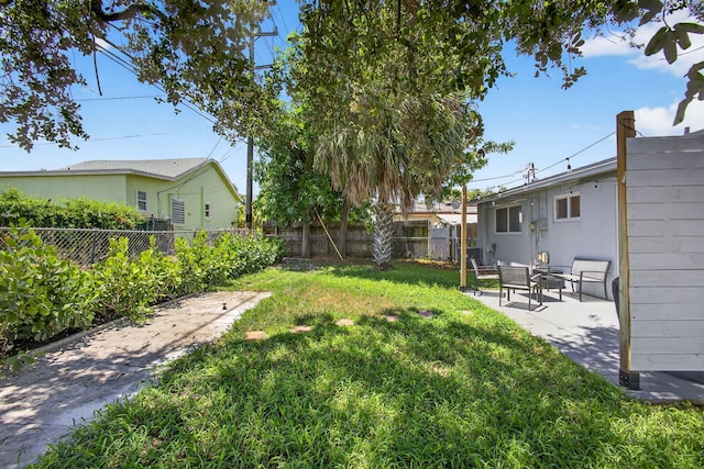 306 N A St, Lake Worth Beach, FL 33460 - fenced backyard with a patio area