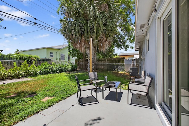 306 N A St, Lake Worth Beach, FL 33460 - fenced backyard with a patio area