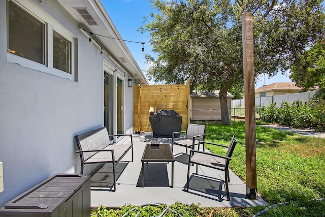 306 N A St, Lake Worth Beach, FL 33460 - fenced backyard featuring a patio area and grilling area