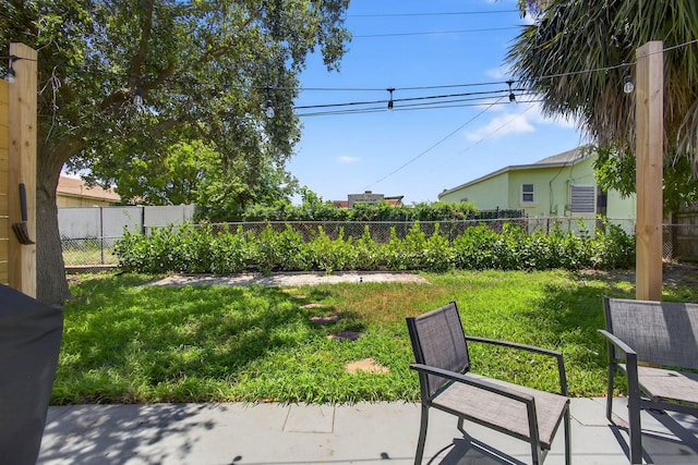 306 N A St, Lake Worth Beach, FL 33460 - fenced backyard with a patio area