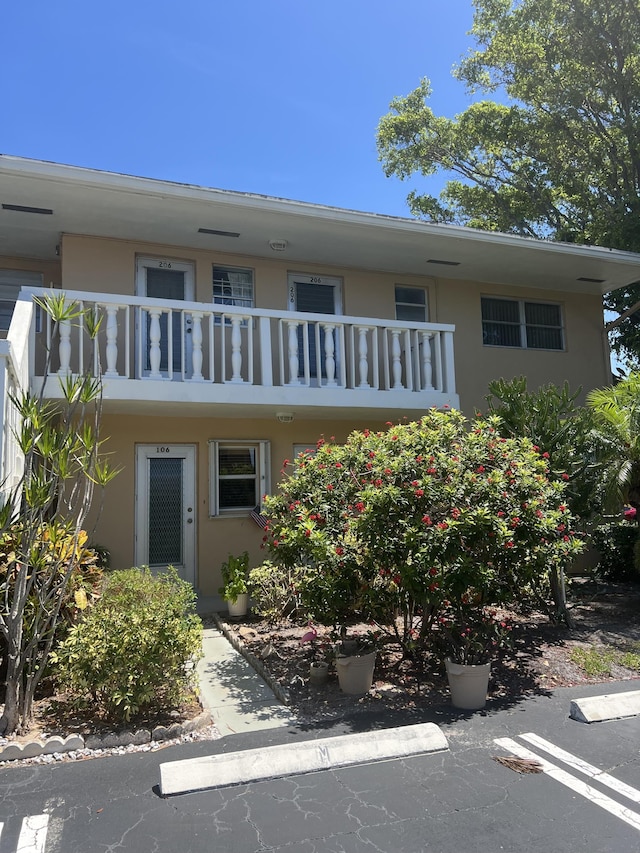 2112 NE 1st Way Unit 206, Boynton Beach, FL 33435 - view of front of home featuring stucco siding and a balcony