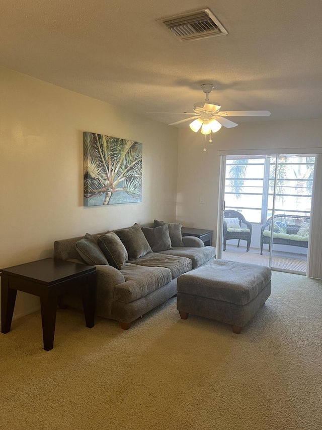 2112 NE 1st Way Unit 206, Boynton Beach, FL 33435 - carpeted living room featuring a ceiling fan