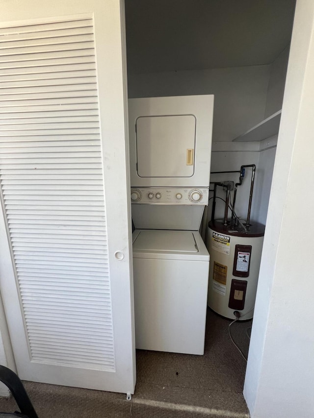 2112 NE 1st Way Unit 206, Boynton Beach, FL 33435 - laundry room featuring electric water heater, stacked washing machine and dryer, and carpet