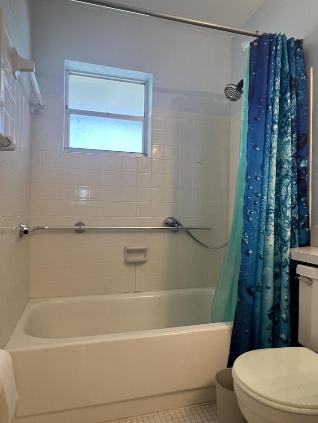 2112 NE 1st Way Unit 206, Boynton Beach, FL 33435 - bathroom with shower / tub combo with curtain and tile patterned floors