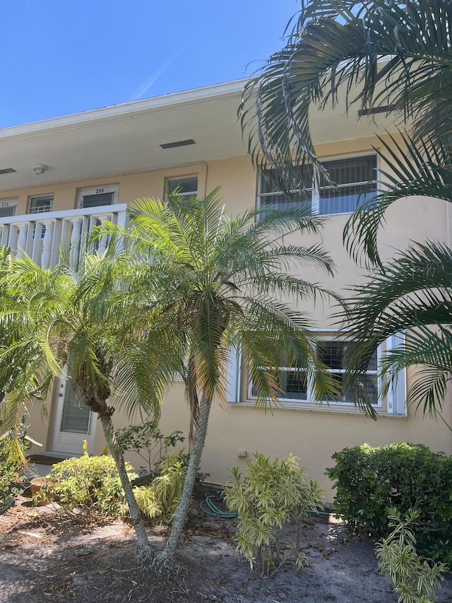 2112 NE 1st Way Unit 206, Boynton Beach, FL 33435 - view of property exterior with stucco siding