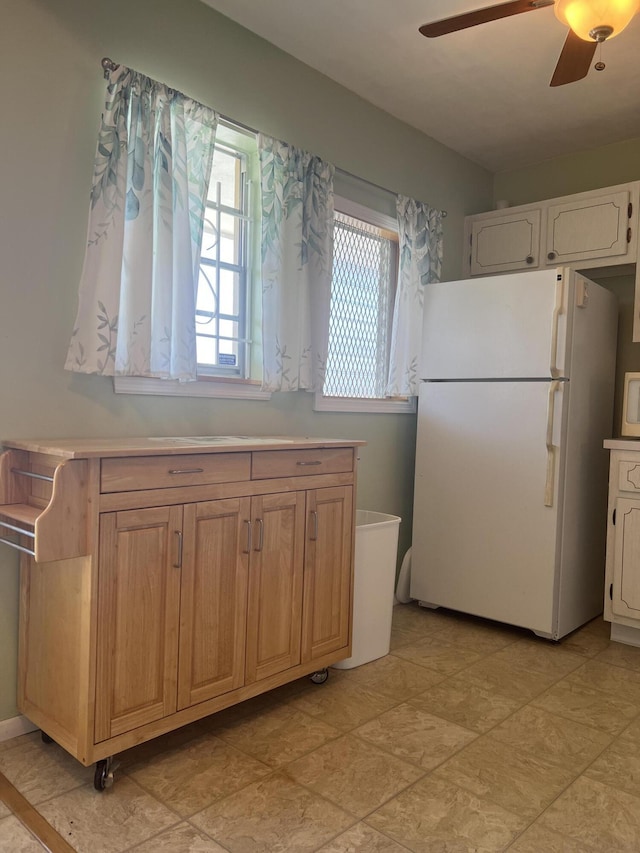 2112 NE 1st Way Unit 206, Boynton Beach, FL 33435 - kitchen featuring freestanding refrigerator, a ceiling fan, and light countertops