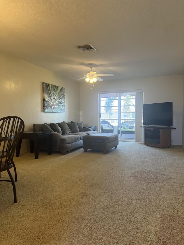 2112 NE 1st Way Unit 206, Boynton Beach, FL 33435 - living area with carpet flooring and ceiling fan