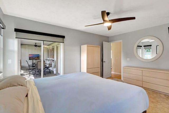 1434 SE Kirke Ln, Port Saint Lucie, FL 34983 - bedroom featuring a ceiling fan and access to exterior