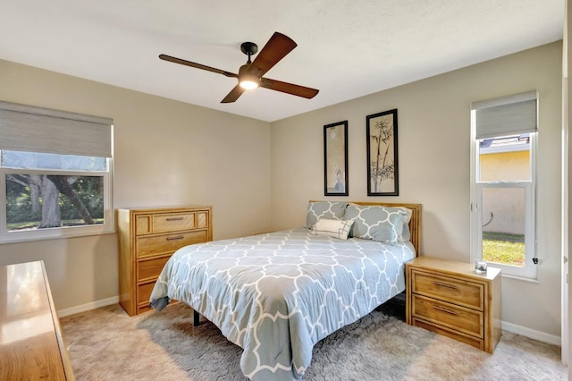 1434 SE Kirke Ln, Port Saint Lucie, FL 34983 - bedroom featuring light colored carpet and ceiling fan