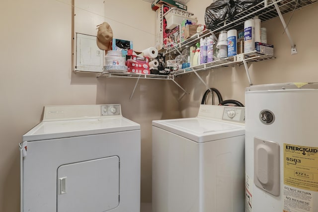 968 Sumter Rd W, West Palm Beach, FL 33415 - laundry room with water heater and washing machine and clothes dryer