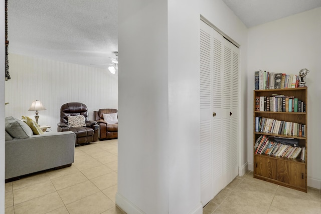 968 Sumter Rd W, West Palm Beach, FL 33415 - corridor with light tile patterned floors and baseboards